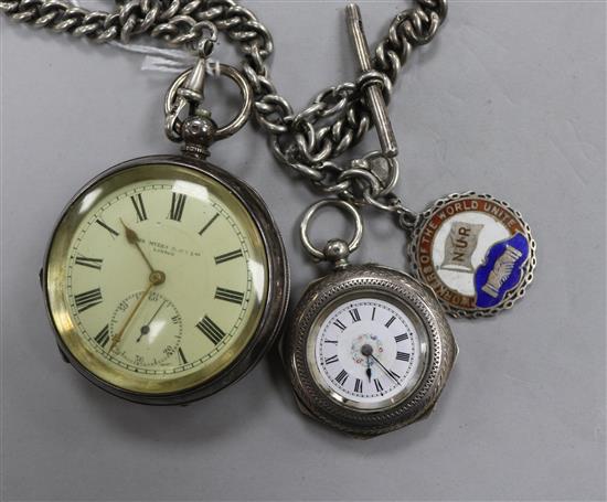 An early 20th century silver pocket watch on a silver albert chain and a silver fob watch.